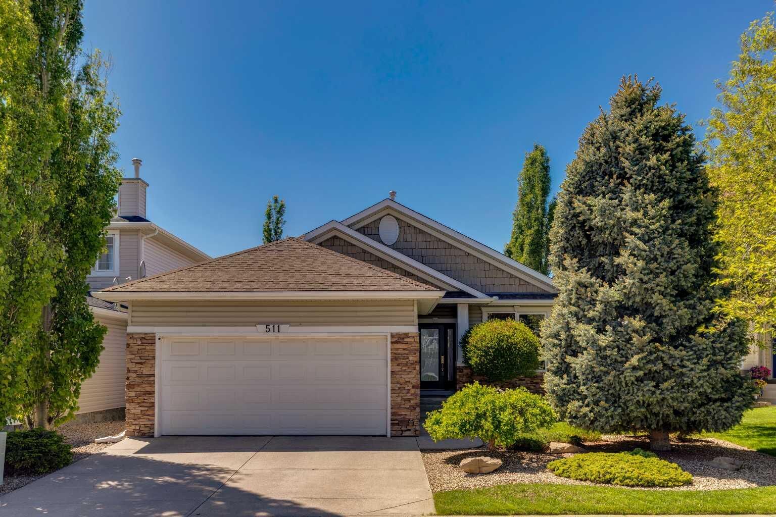 Property Photo:  511 Rocky Ridge Drive NW  AB T3G 5C3 