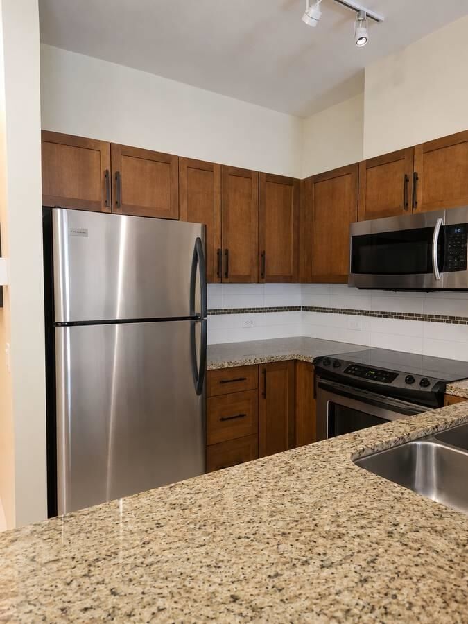 Property Photo:  11950 Harris Rd 417  BC V3Y 0B7 