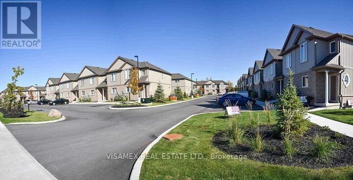 Property Photo:  7768 Ascot Circle 11  ON L2H 3P9 