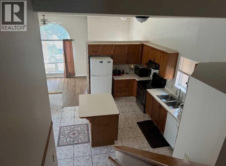 Property Photo: 6934 Laguna Way Northeast AB T1Y 6W2