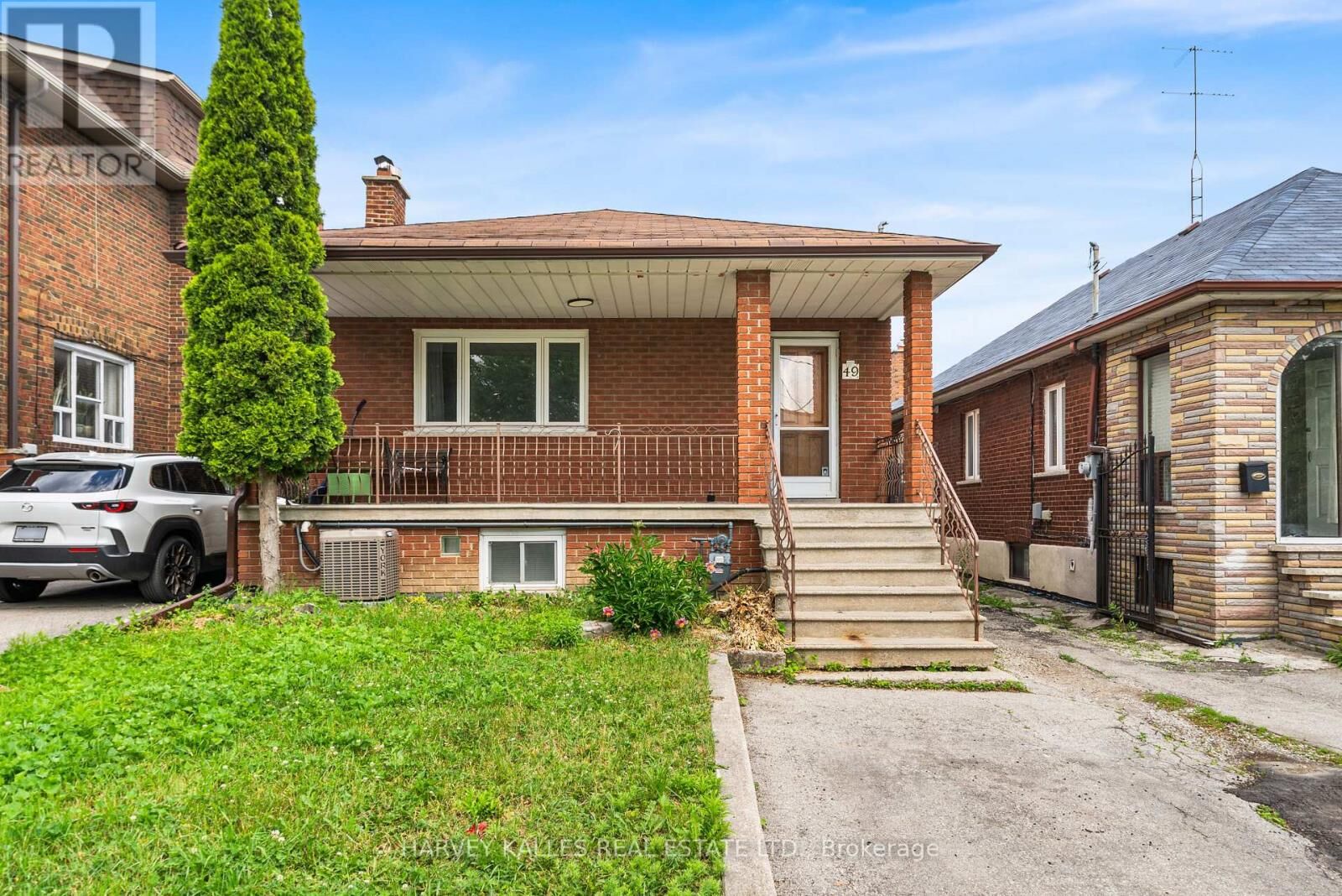 Property Photo:  49 Fairbank Avenue Main  ON M6E 3Y6 