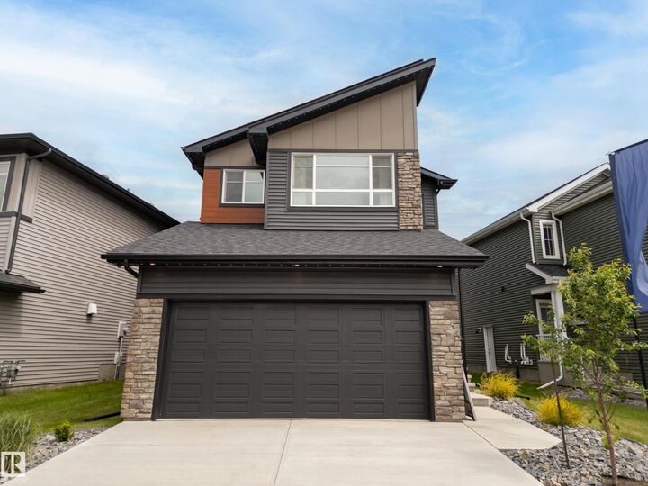 Property Photo:  9307 229 St NW  AB T5T 4W8 