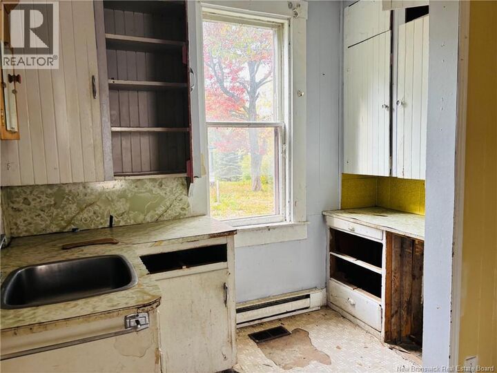 Property Photo:  22 Beech Street  NB E6J 1V8 