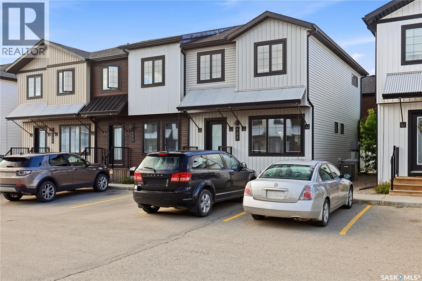 Property Photo:  122 2715 Narcisse Drive  SK S4X 0P8 
