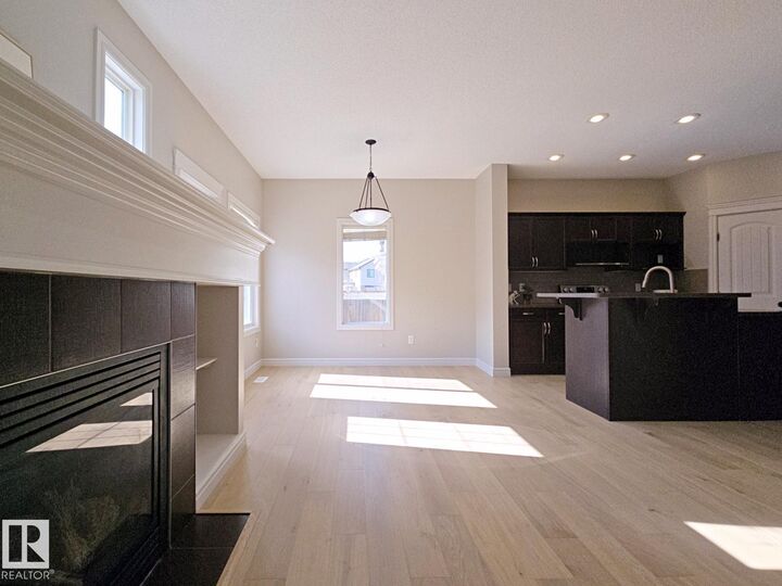 Property Photo:  11525 18A Avenue SW  AB T6W 2E6 