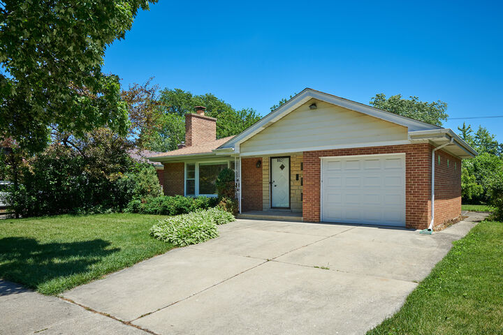 Property Photo:  9027 Kenton Avenue  IL 60076 