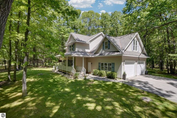 Property Photo: 1424 Timber Ridge Drive MI 49660