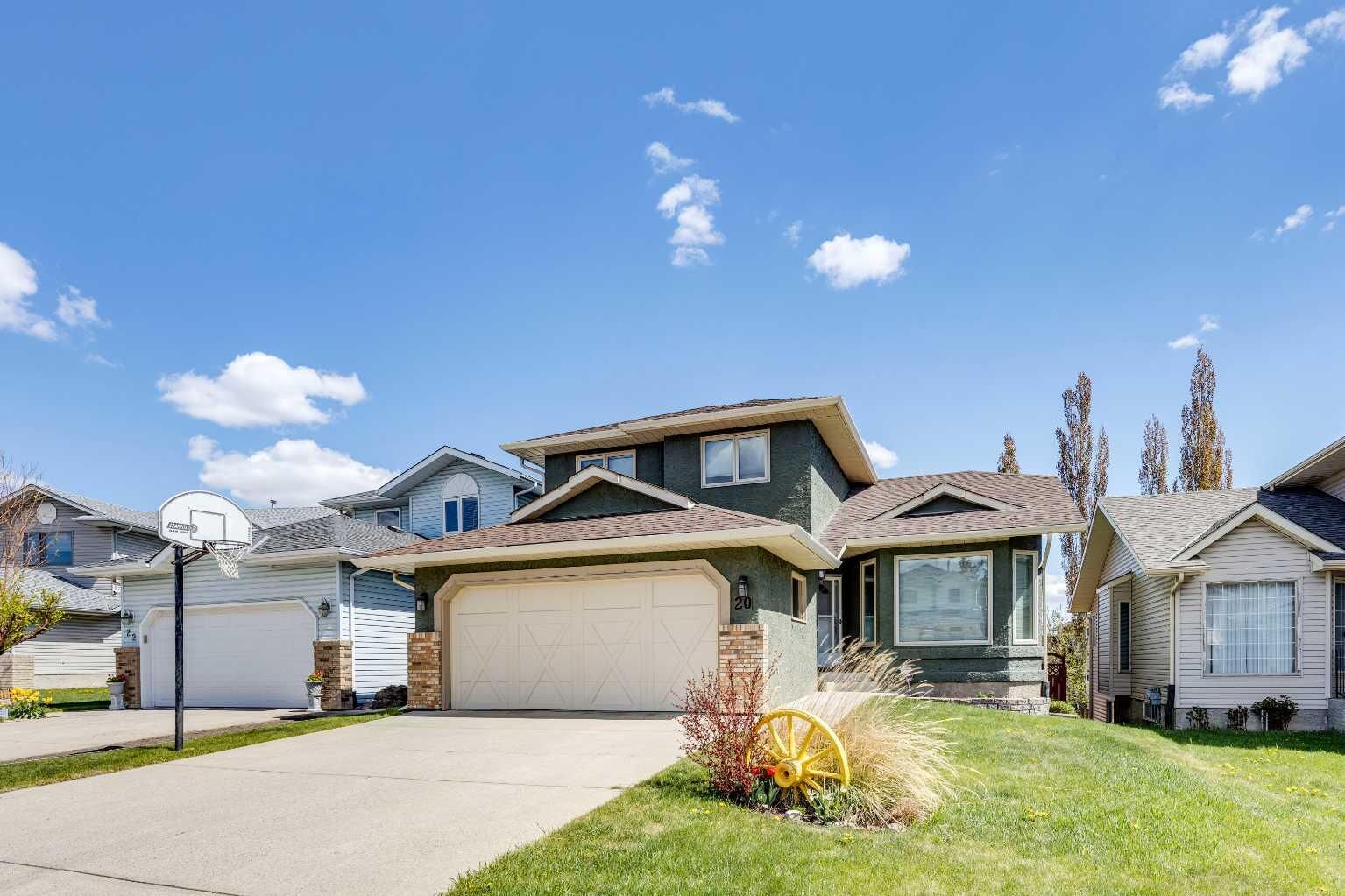 Property Photo: 20 Macewan Ridge View NW AB T3K 3W2