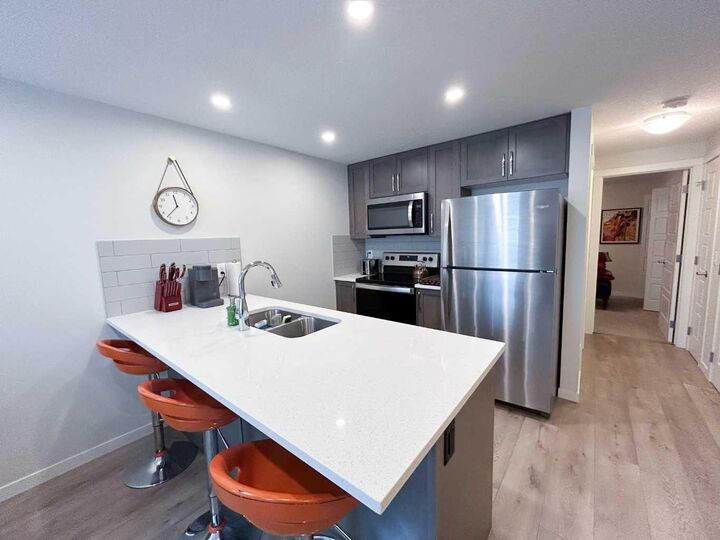 Property Photo: 260 Rowley Way NW 317 AB T3L 0H5