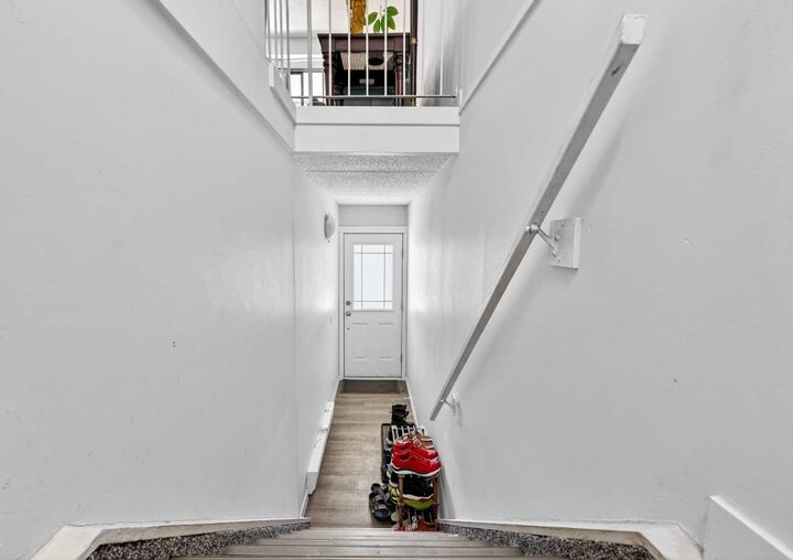 Property Photo: 2200 Woodview Drive SW 1112 AB T2W 3N6