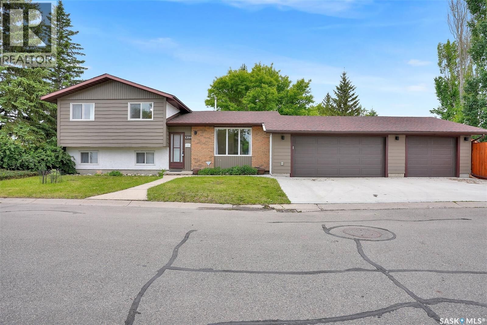 Property Photo: 1244 Runciman Crescent N SK S4X 3A8