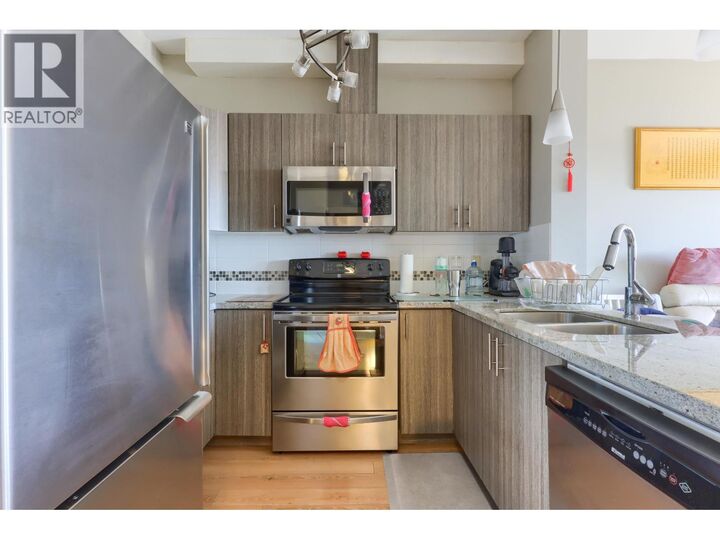 Property Photo:  7738 Edmonds Street Ph1  BC V3N 1B8 