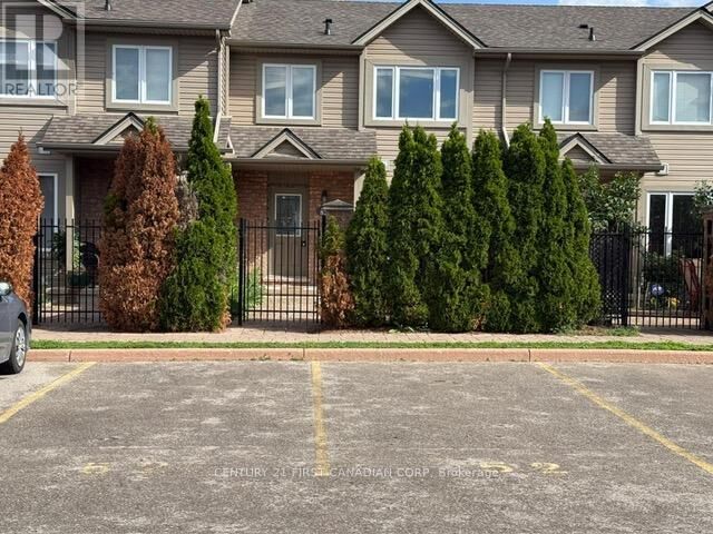 Property Photo:  1600 Mickleborough Drive 52  ON N6G 5R9 