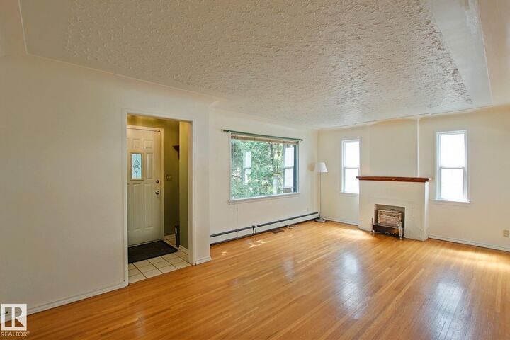 Property Photo: 11242 56 Street NW AB T5W 3S2