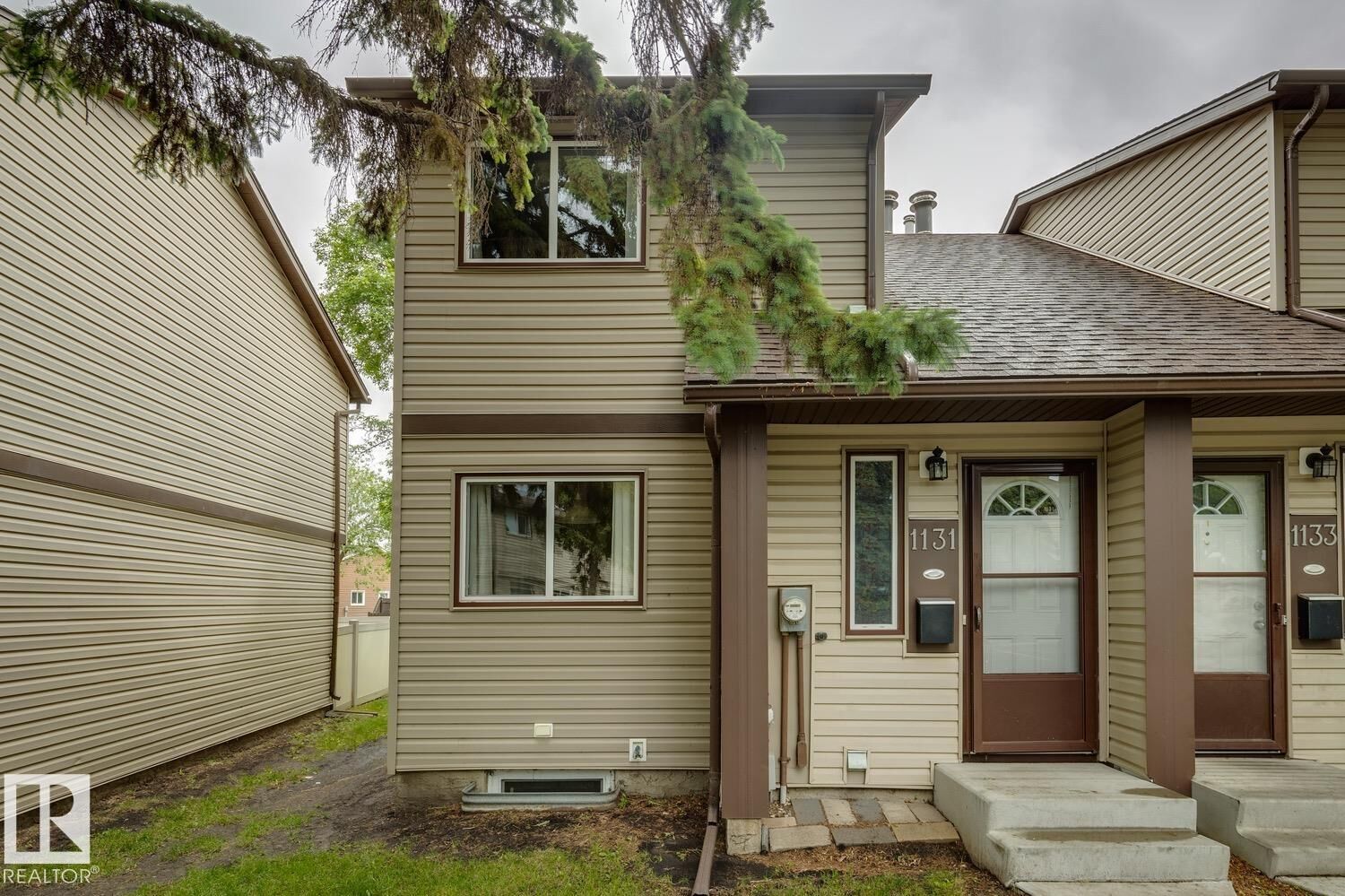 Property Photo:  1131 Hooke Road NW  AB T5A 4A5 