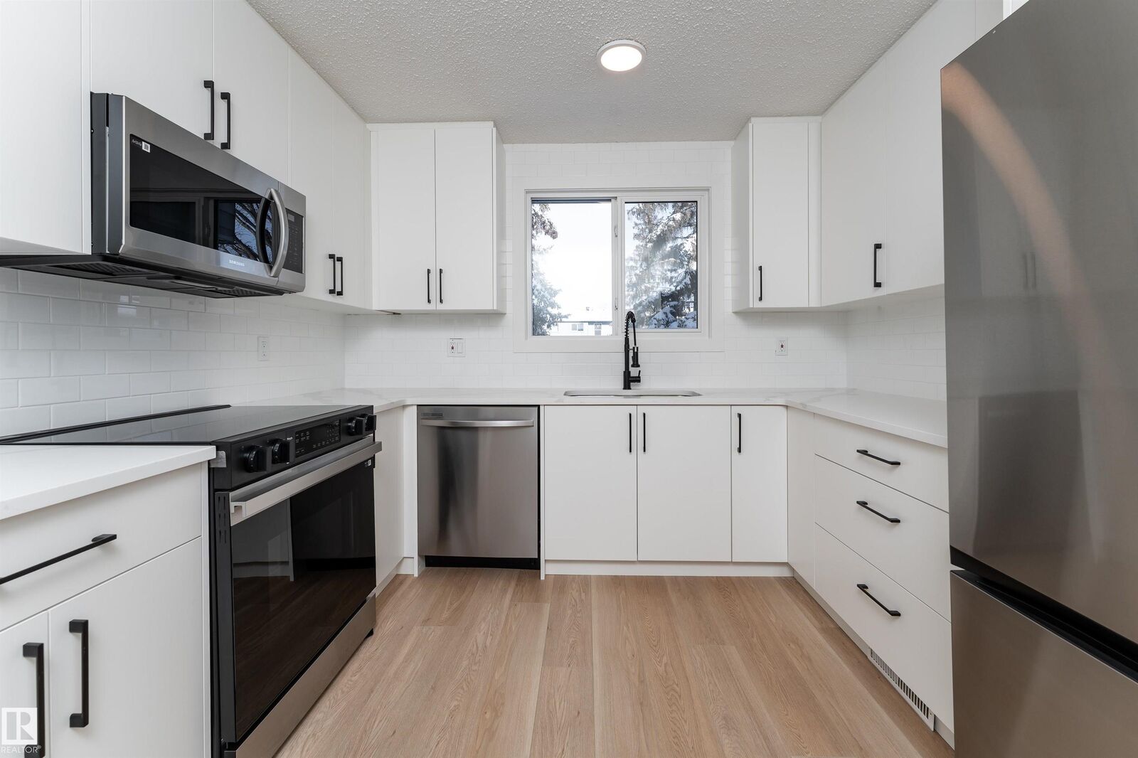 Property Photo:  3108 142 Avenue NW  AB T5Y 1H2 