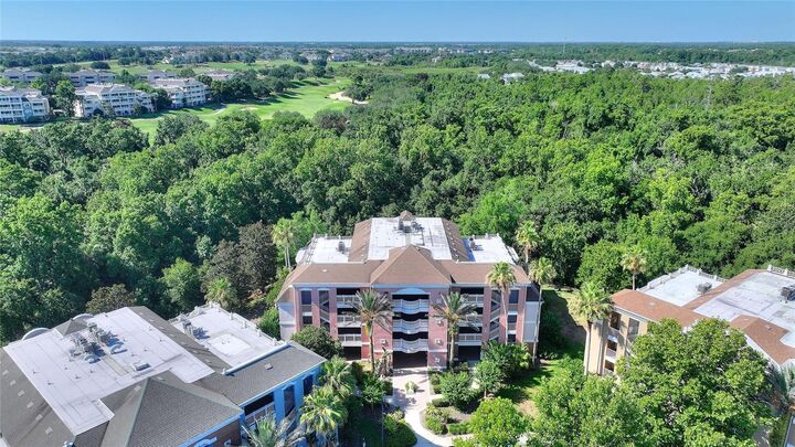 Property Photo: 7656 Whisper Way 402 FL 34747