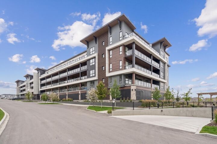 Property Photo: 1802 Mahogany Boulevard SE 7107 AB T3M 4A5