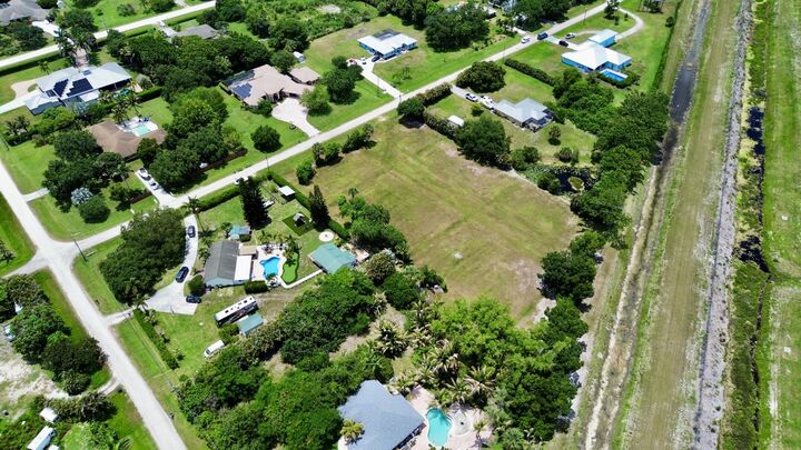 Property Photo: 16546 74th Avenue N FL 33418