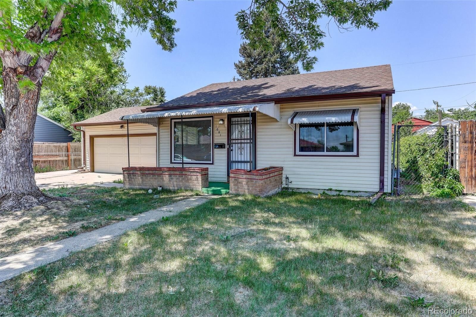 Property Photo: 1081 S Knox Court CO 80219