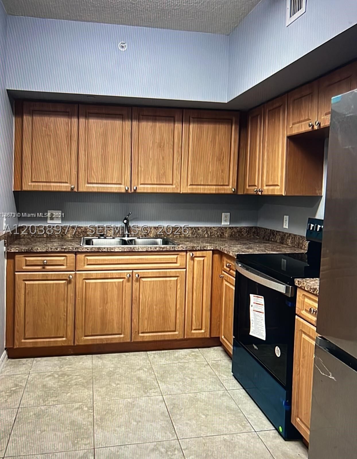 Property Photo:  115 SW 42nd Ave 206  FL 33134 