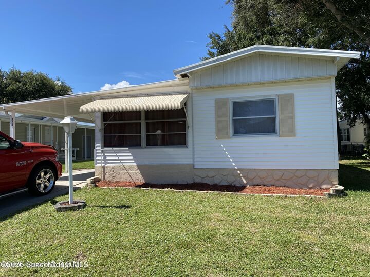 Property Photo:  703 Lark Drive  FL 32976 
