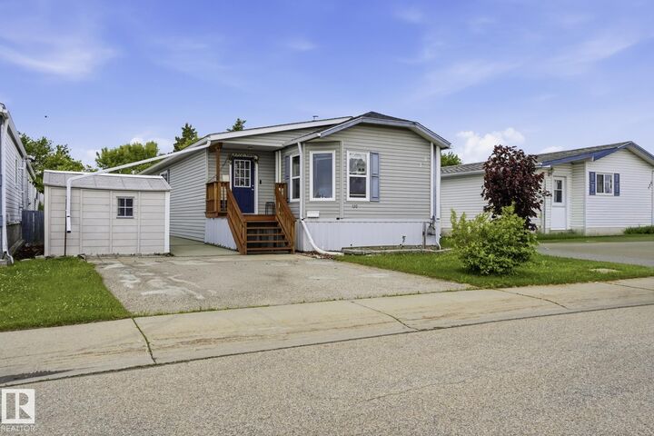 Property Photo: 120 Springfield Crescent AB T7X 3H8