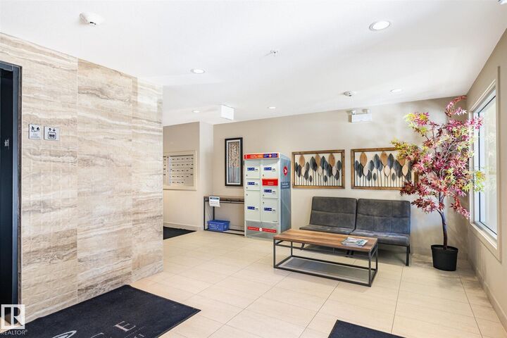 Property Photo: 1029 173 Street SW 210 AB T6W 3E4
