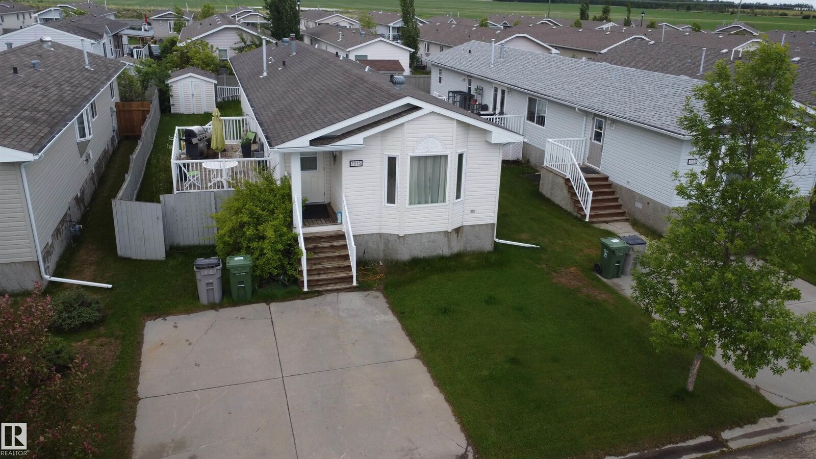Property Photo: 1015 Aspen Drive AB T9E 8R5