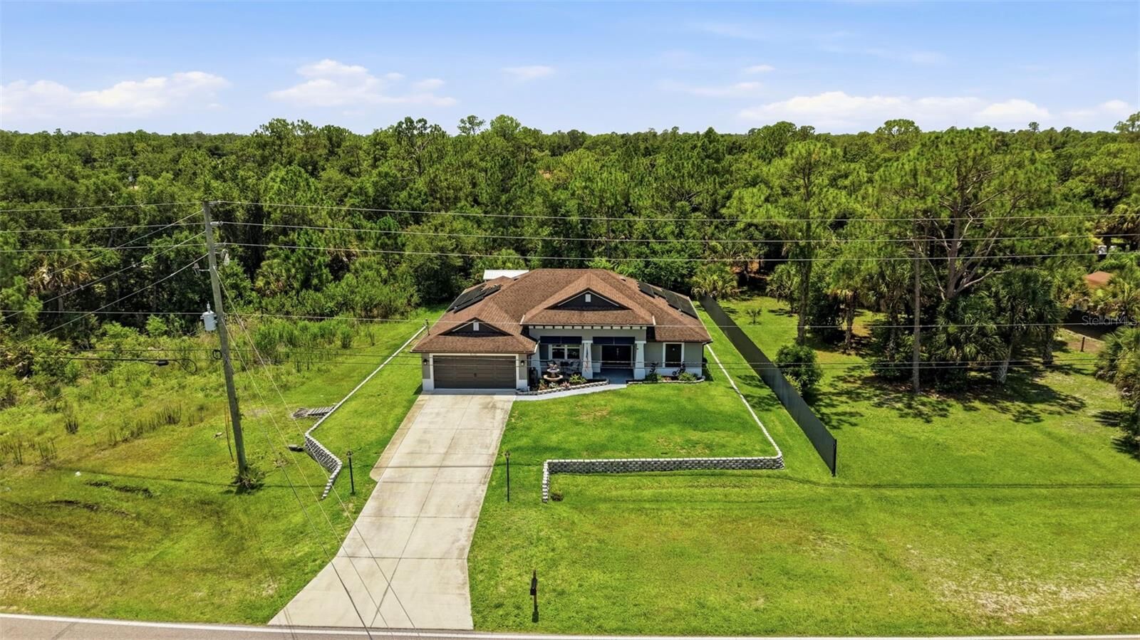Property Photo:  6755 Tropicaire Boulevard  FL 34291 
