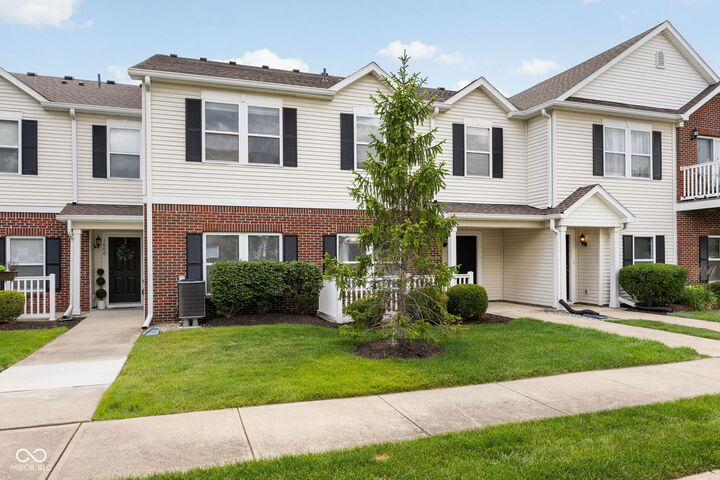 Property Photo:  12175 Bubbling Brook Drive Unit 1100  IN 46038 