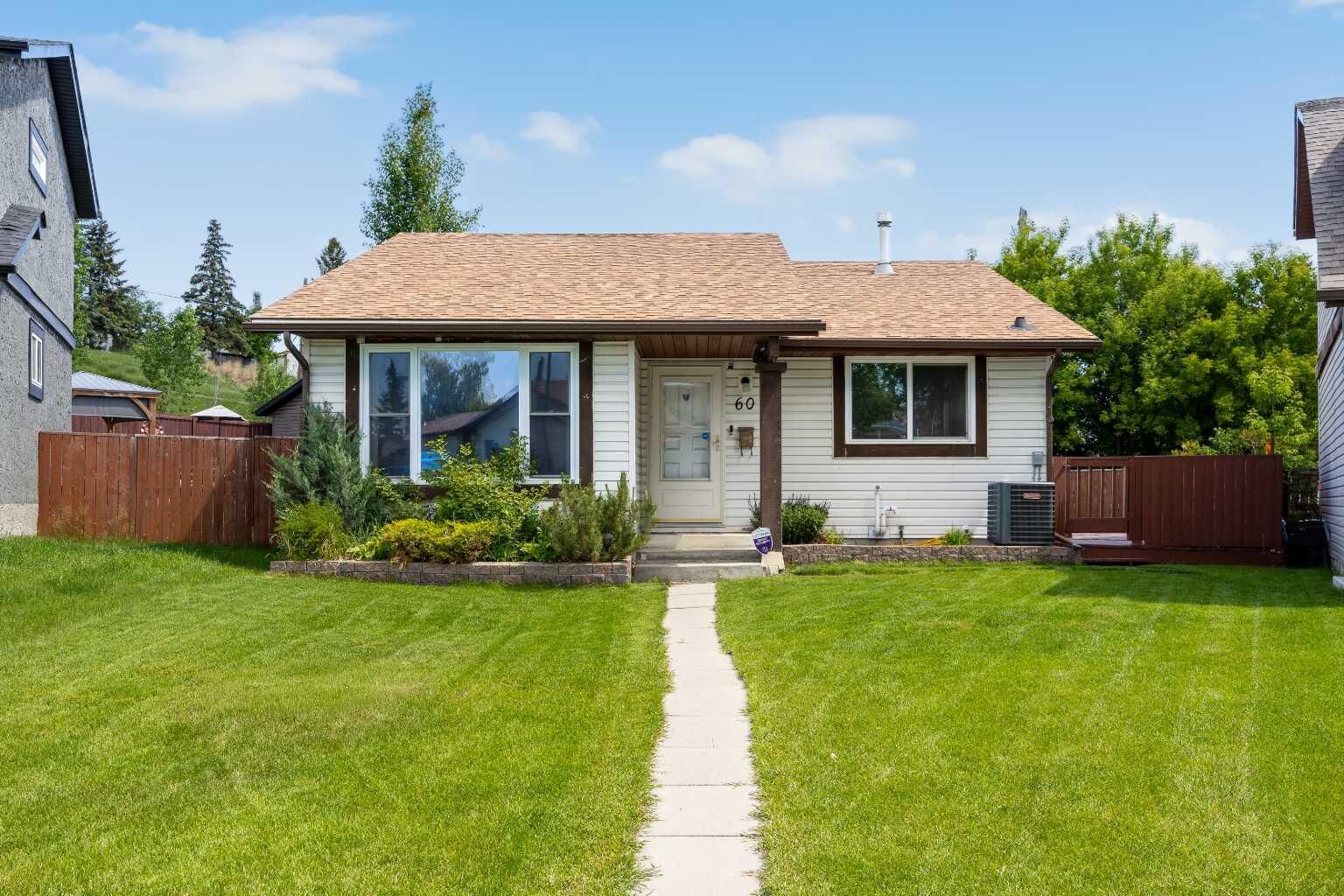 Property Photo:  60 Ogmoor Crescent SE  AB T2C 2E9 