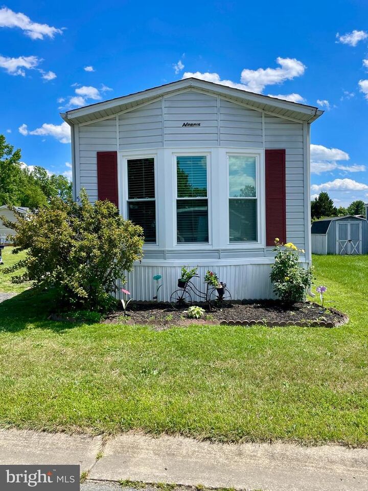 Property Photo:  5 Milkweed Court 245  DE 19713 