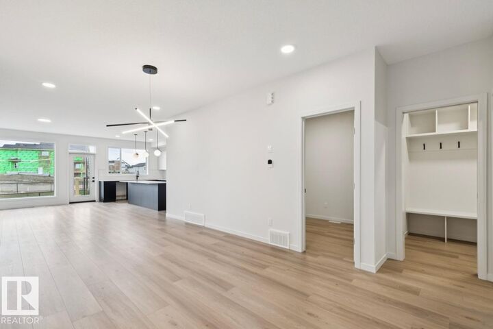 Property Photo: 7351 Klapstein Crescent SW AB T6W 5R8