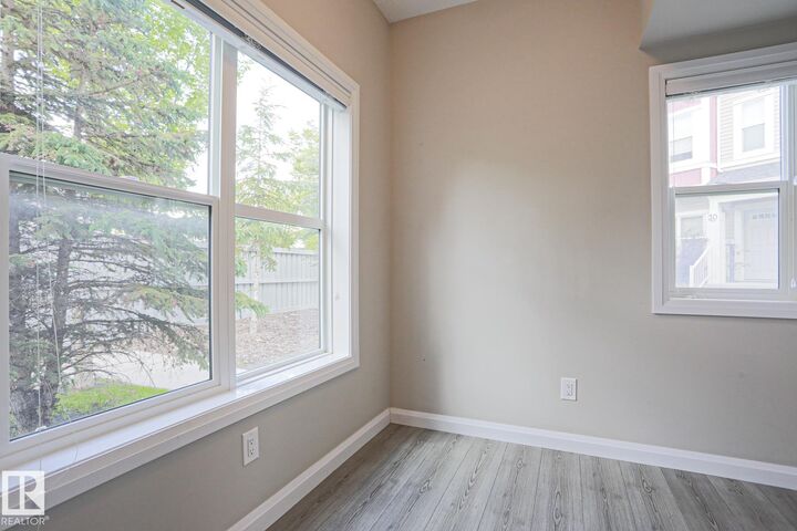 Property Photo: 3710 Allan Drive SW 33 AB T6W 2C4