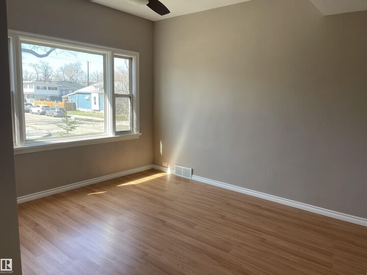 Property Photo:  11161 96 Street NW  AB T5G 1S8 