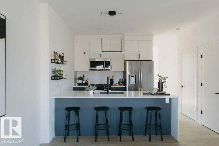 Property Photo: 3220 Orchards Drive SW AB T6X 1V2