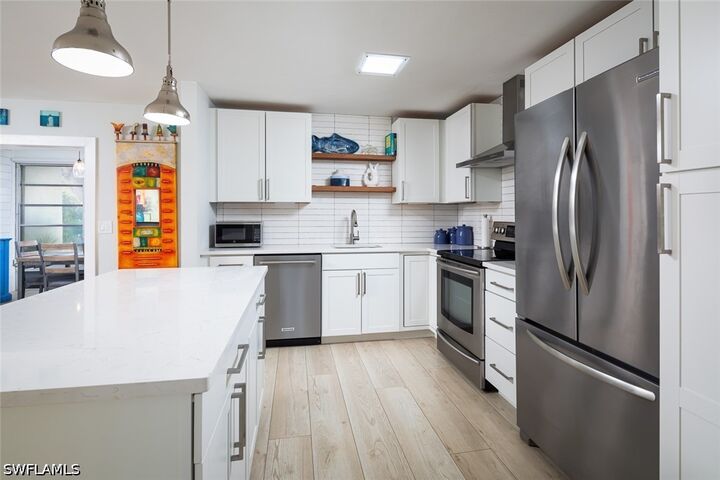 Property Photo: 4171 Lakewood Boulevard E-25 FL 34112