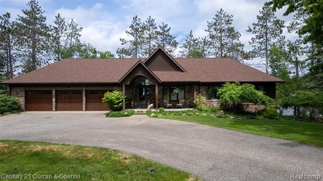 Property Photo:  8775 Winding Ridge Drive  MI 49759 