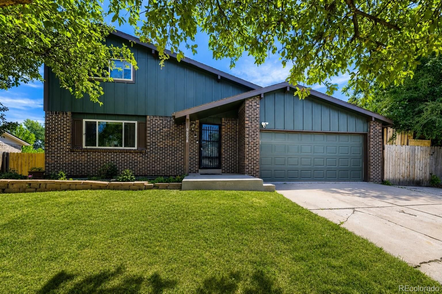 Property Photo: 9400 W Burgundy Avenue CO 80123