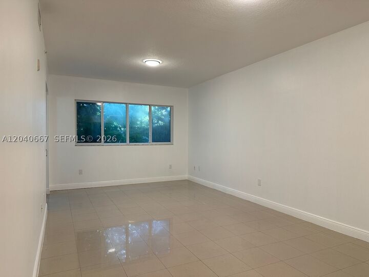 Property Photo: 652 NE 63rd St 102 FL 33138