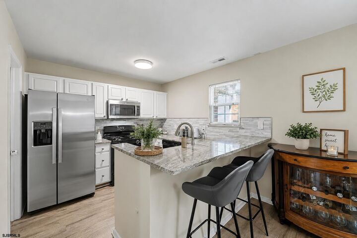 Property Photo:  1553 Benjamin Franklin Court 1553  NJ 08330 