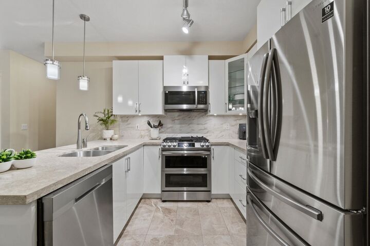 Property Photo:  20376 86 Avenue 208  BC V2Y 3P8 