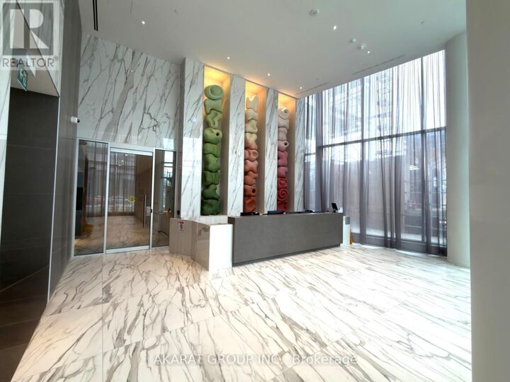 Property Photo:  448 Burnhamthorpe Road West 4911  ON L5B 0R4 