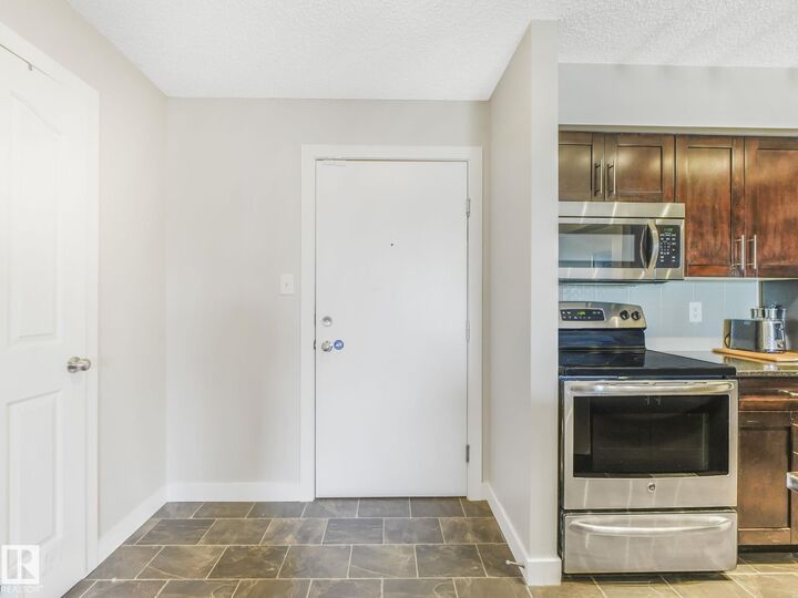 Property Photo:  270 McConachie Drive NW #404  AB T5Y 3N4 