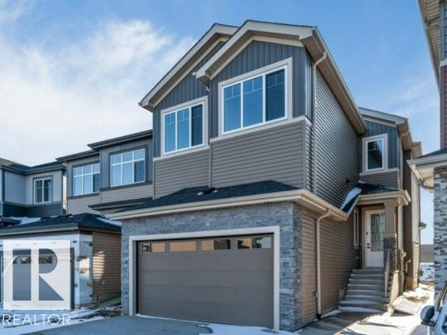 Property Photo:  7023 177 Avenue NW  AB T5Z 0W9 