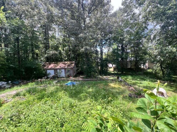 Property Photo:  2460 Hallie Mill Road  GA 30349 