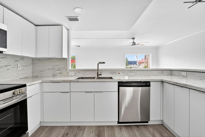 Property Photo: 495 SE 8th Street 242 FL 33441