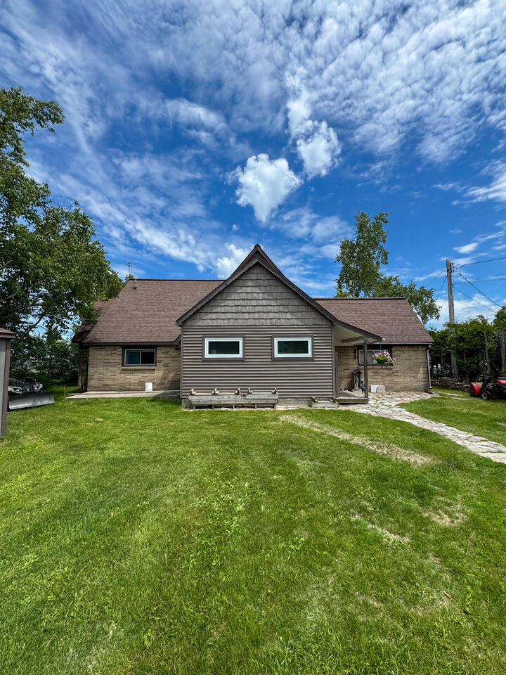 Property Photo: 1803 Shore Dr MI 49781