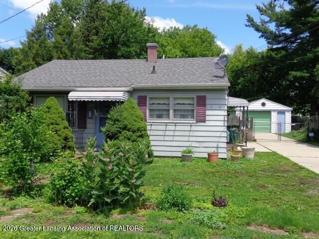 Property Photo: 216 W Jolly Road MI 48910